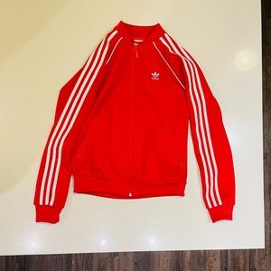 Jacket and pants adidas red track suit.